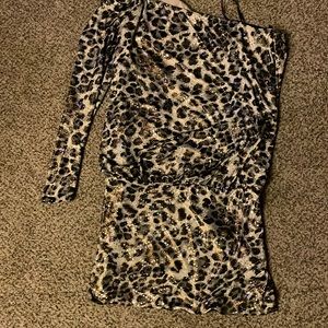 Women’s sexy animal print brown and tan with shiny spec.. never worn